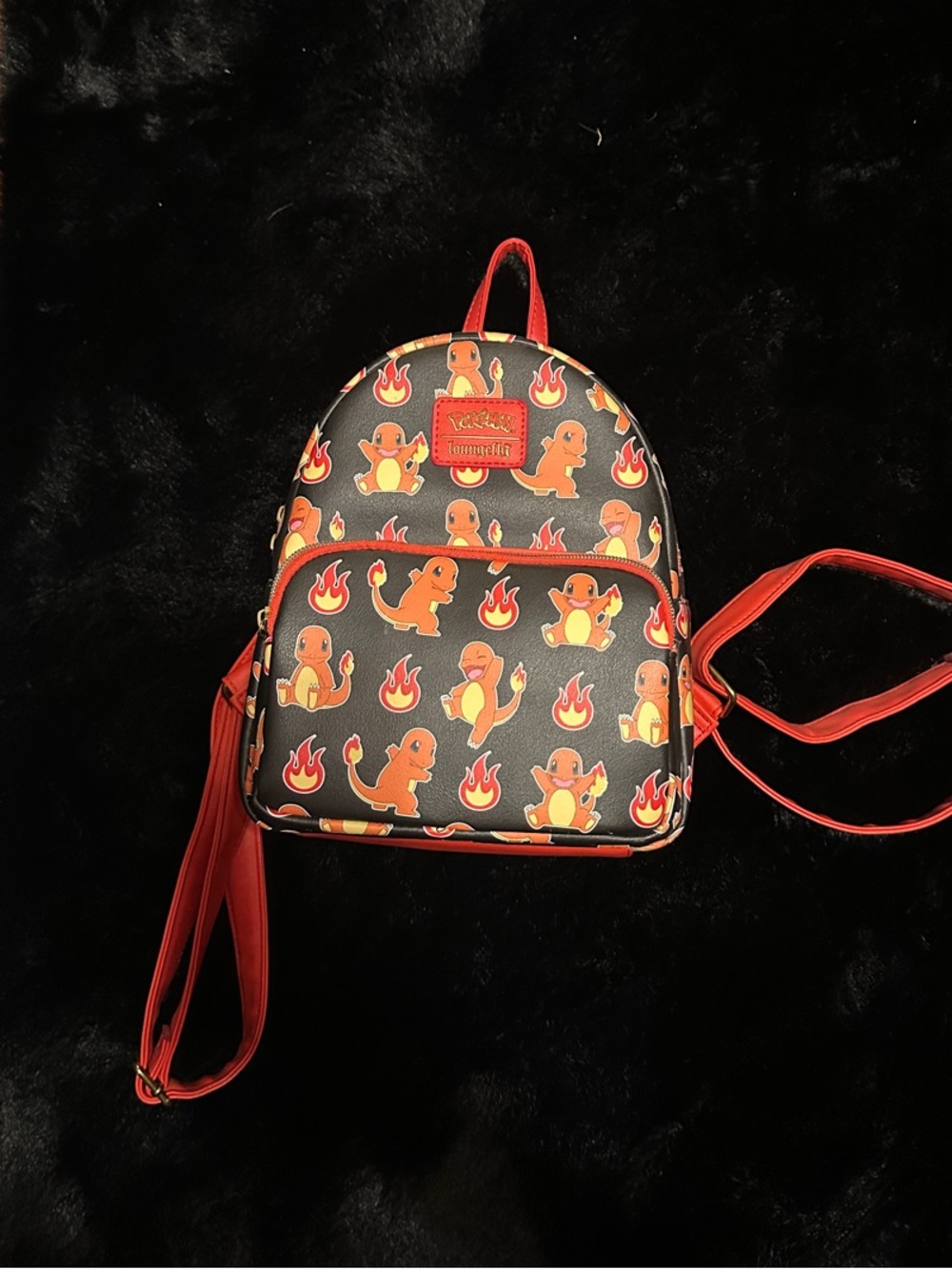 Kids Black & Red Charm Backpack with Orange Cartoon Character Print